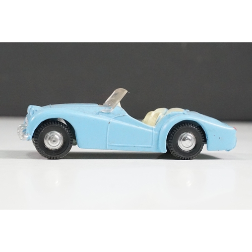 493A - Boxed Triang Spot On No 108 Triumph TR3 diecast model in blue, diecast grubby but good with windscre... 