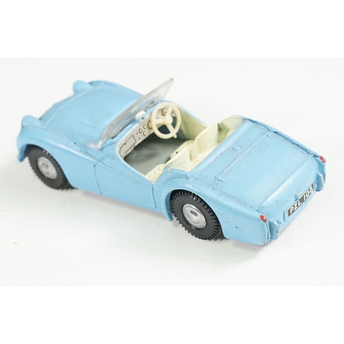 493A - Boxed Triang Spot On No 108 Triumph TR3 diecast model in blue, diecast grubby but good with windscre... 