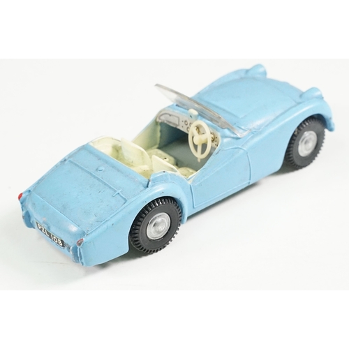 493A - Boxed Triang Spot On No 108 Triumph TR3 diecast model in blue, diecast grubby but good with windscre... 