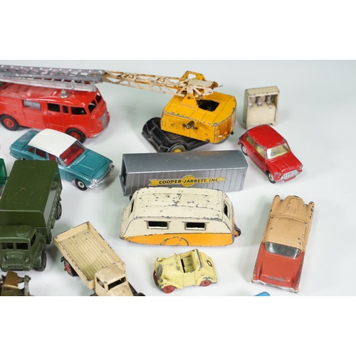 291 - Around 30 Mid 20th C onwards playworn diecast models to include Dinky, Corgi, Budgie Toys, Astra, Ma... 