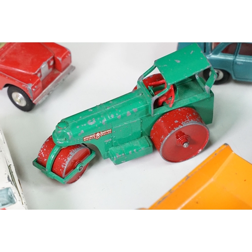 291 - Around 30 Mid 20th C onwards playworn diecast models to include Dinky, Corgi, Budgie Toys, Astra, Ma... 