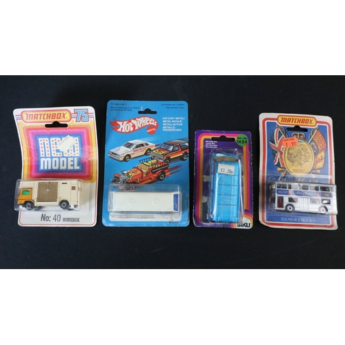 355 - 30 Boxed / carded diecast models to include Majorette, Matchbox, Lledo, Mattel Hot Wheels (opened ca... 