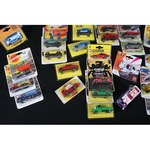 332 - 59 Carded / boxed Corgi & Corgi Junior diecast models to include 223 Safari, 113 Wild West, 105 Ford... 