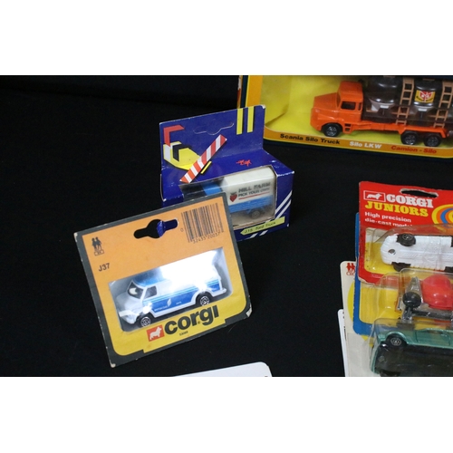 332 - 59 Carded / boxed Corgi & Corgi Junior diecast models to include 223 Safari, 113 Wild West, 105 Ford... 