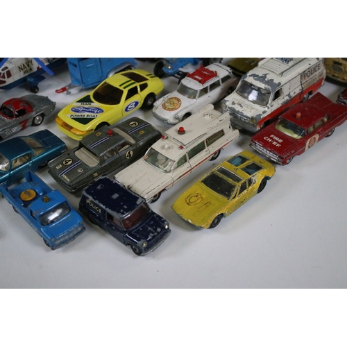 311 - Over 30 mid 20th C play worn diecast & plastic models to include Dinky, Corgi, Lonestar etc