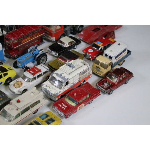 311 - Over 30 mid 20th C play worn diecast & plastic models to include Dinky, Corgi, Lonestar etc