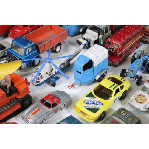 311 - Over 30 mid 20th C play worn diecast & plastic models to include Dinky, Corgi, Lonestar etc
