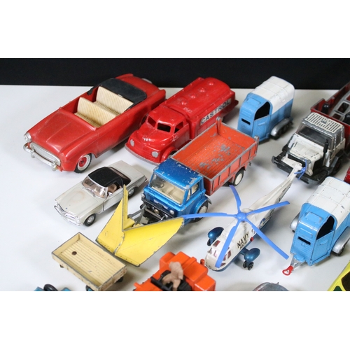 311 - Over 30 mid 20th C play worn diecast & plastic models to include Dinky, Corgi, Lonestar etc