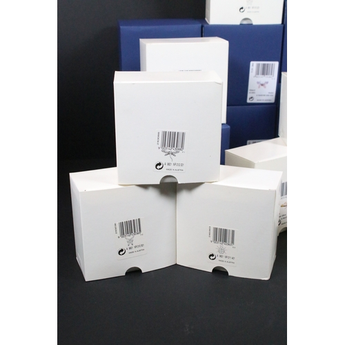 81 - Twenty-five boxed Swarovski crystal glass ornaments, to include a selection of 925 Sterling Silver g... 
