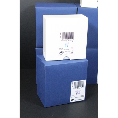 81 - Twenty-five boxed Swarovski crystal glass ornaments, to include a selection of 925 Sterling Silver g... 