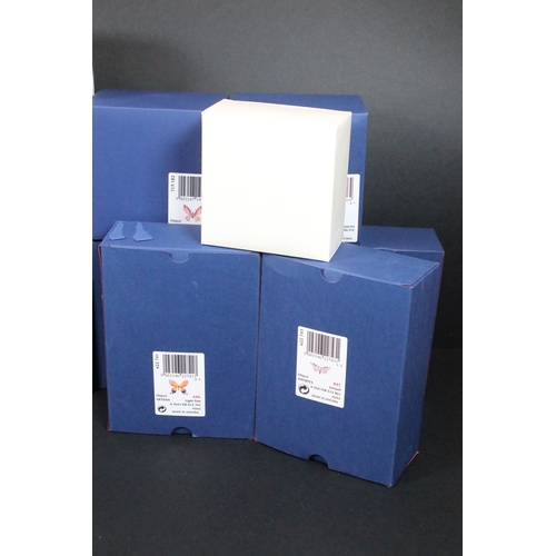 81 - Twenty-five boxed Swarovski crystal glass ornaments, to include a selection of 925 Sterling Silver g... 