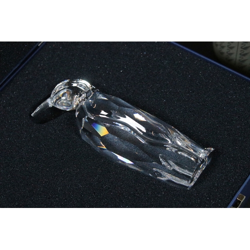 82 - Collection of Swarovski crystal ornaments, to comprise Swarovski Collectors Society examples, Tulips... 