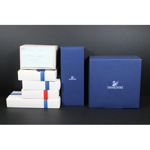 82 - Collection of Swarovski crystal ornaments, to comprise Swarovski Collectors Society examples, Tulips... 