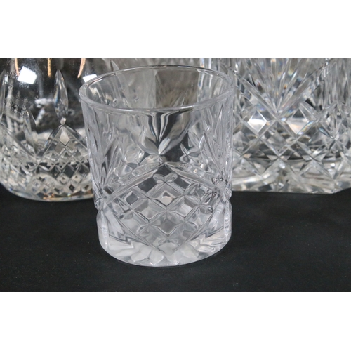 84 - Group of cut and moulded glass, to comprise primarily decanters, three of facetted square form, two ... 