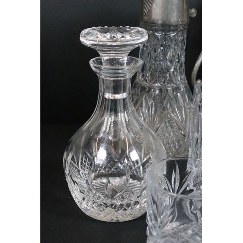 84 - Group of cut and moulded glass, to comprise primarily decanters, three of facetted square form, two ... 