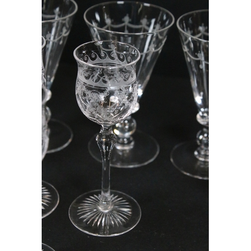 87 - Collection of engraved glassware, to include four wine glasses, six liqueur glasses and one decanter... 