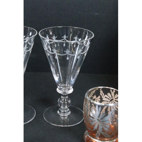87 - Collection of engraved glassware, to include four wine glasses, six liqueur glasses and one decanter... 