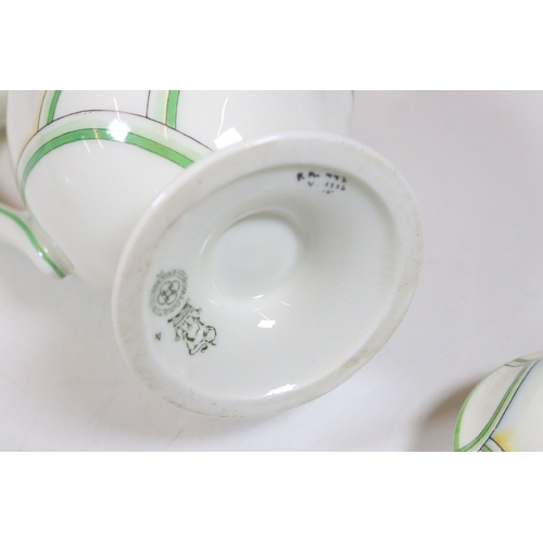 88 - Royal Doulton part coffee service, six place setting, together with Art Deco plate. Tallest measures... 