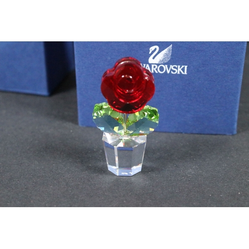 89 - Twenty-six boxed Swarovski crystal glass ornaments, to include 'Kim Tulip', 'Dino the Dinosaur', 'Ra... 