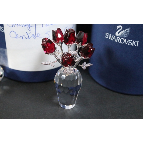 89 - Twenty-six boxed Swarovski crystal glass ornaments, to include 'Kim Tulip', 'Dino the Dinosaur', 'Ra... 