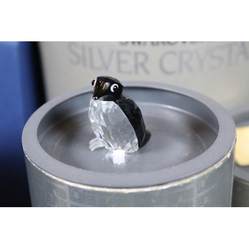 89 - Twenty-six boxed Swarovski crystal glass ornaments, to include 'Kim Tulip', 'Dino the Dinosaur', 'Ra... 