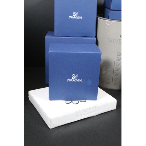89 - Twenty-six boxed Swarovski crystal glass ornaments, to include 'Kim Tulip', 'Dino the Dinosaur', 'Ra... 