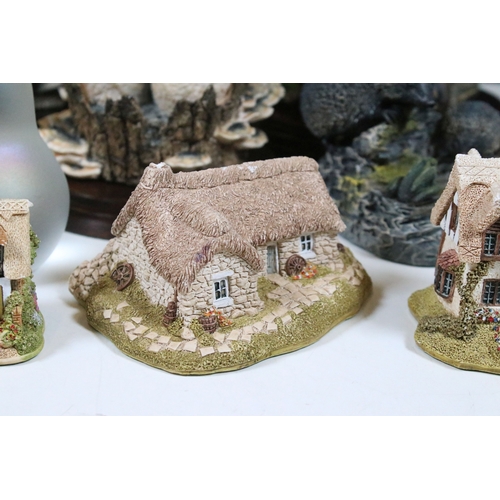 91 - Group of Lilliput Lane and David Winter cottages, to include The Bakehouse, mother's Cottage, etc., ... 