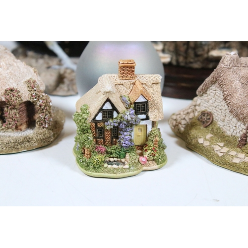 91 - Group of Lilliput Lane and David Winter cottages, to include The Bakehouse, mother's Cottage, etc., ... 