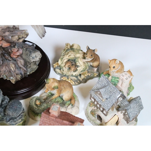 91 - Group of Lilliput Lane and David Winter cottages, to include The Bakehouse, mother's Cottage, etc., ... 