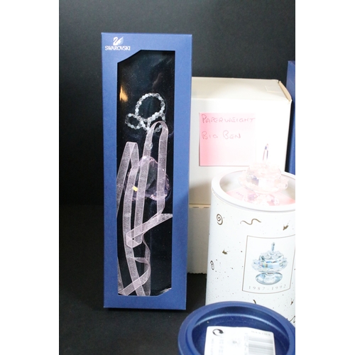 92 - Collection of Swarovski crystal, comprising primarily commemoratives and paperweights, including hea... 