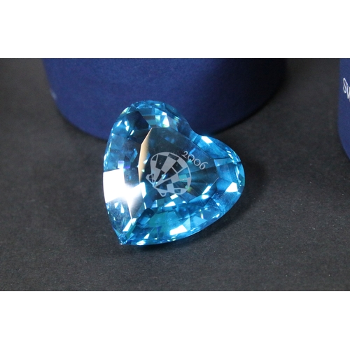 92 - Collection of Swarovski crystal, comprising primarily commemoratives and paperweights, including hea... 