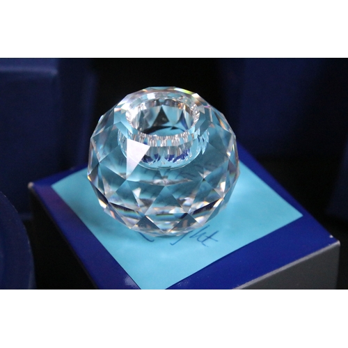 92 - Collection of Swarovski crystal, comprising primarily commemoratives and paperweights, including hea... 