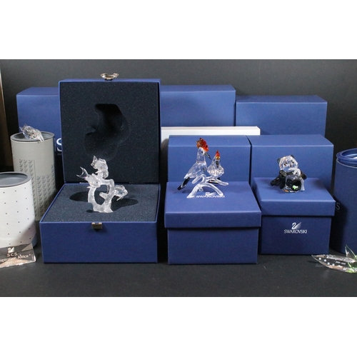 93 - Eleven boxed Swarovski crystal glass ornaments, to include ornaments from the 'Endangered Wildlife' ... 