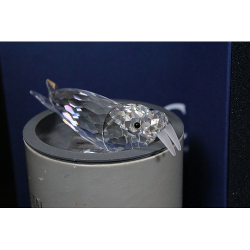 93 - Eleven boxed Swarovski crystal glass ornaments, to include ornaments from the 'Endangered Wildlife' ... 