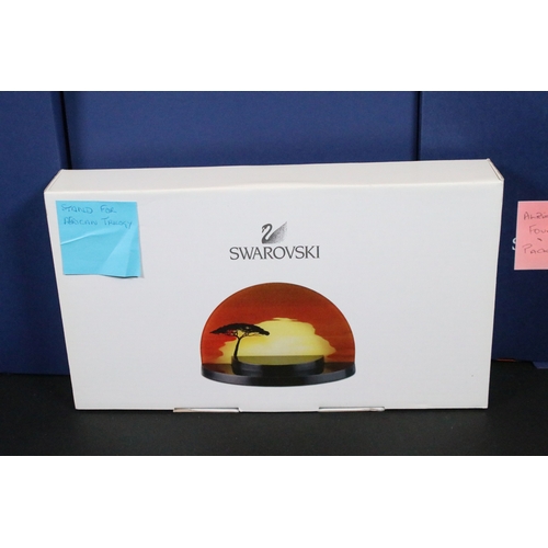 93 - Eleven boxed Swarovski crystal glass ornaments, to include ornaments from the 'Endangered Wildlife' ... 