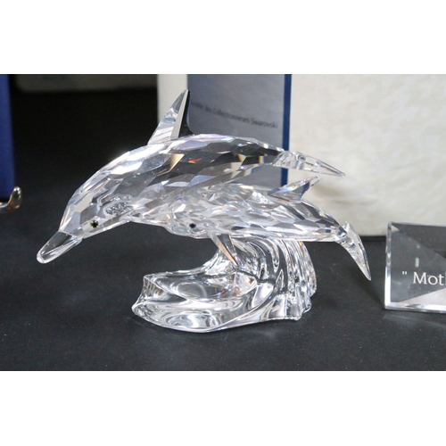 95 - Four boxed Swarovski Crystal Society ornaments, to include 'The Pegasus' 216327 and 'The Unicorn' 19... 