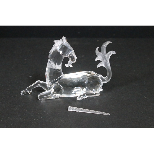 95 - Four boxed Swarovski Crystal Society ornaments, to include 'The Pegasus' 216327 and 'The Unicorn' 19... 