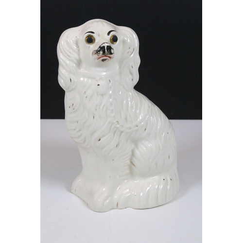99 - Group of 19th century Staffordshire pottery, to include Scottish dancers, pair of Greyhound figures ... 