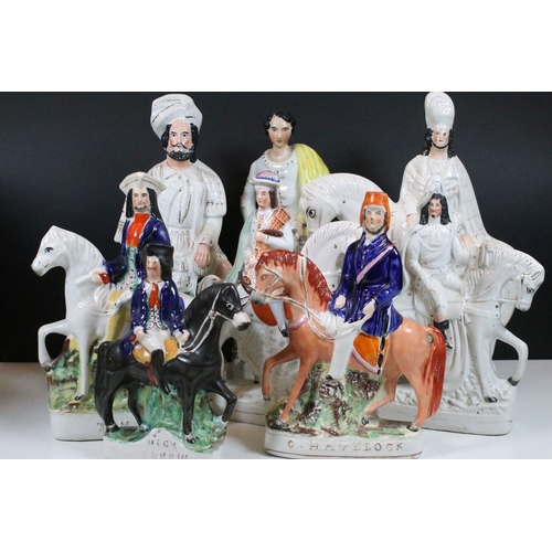 101 - Collection of eight Staffordshire figures, to include The Lion Slayer, Dick Turpin, Tom King. Talles... 