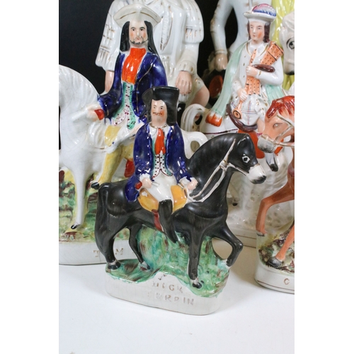 101 - Collection of eight Staffordshire figures, to include The Lion Slayer, Dick Turpin, Tom King. Talles... 