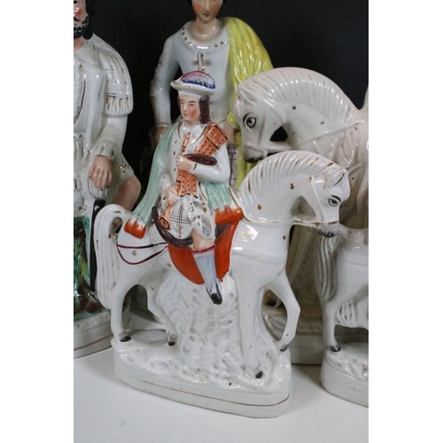 101 - Collection of eight Staffordshire figures, to include The Lion Slayer, Dick Turpin, Tom King. Talles... 