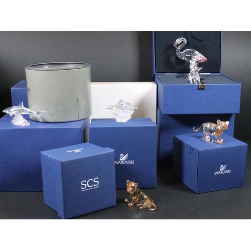 106 - Eleven boxed Swarovski crystal glass ornaments, to include Tiger Cub (originally only available to S... 