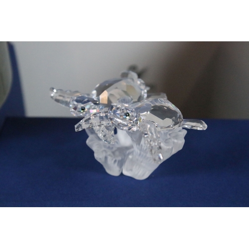 106 - Eleven boxed Swarovski crystal glass ornaments, to include Tiger Cub (originally only available to S... 