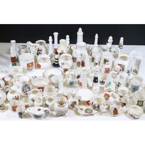 113 - Collection of Goss crested china, to include lighthouses, vases and pin dishes. Tallest measures 14.... 