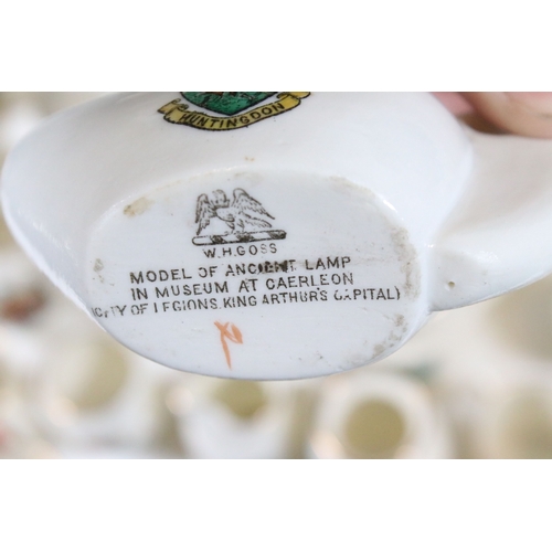 113 - Collection of Goss crested china, to include lighthouses, vases and pin dishes. Tallest measures 14.... 