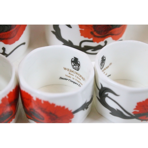 111 - Wedgwood 'Corn Poppy' (Susie Cooper design) patterned part dinner and tea set, to include tea and co... 