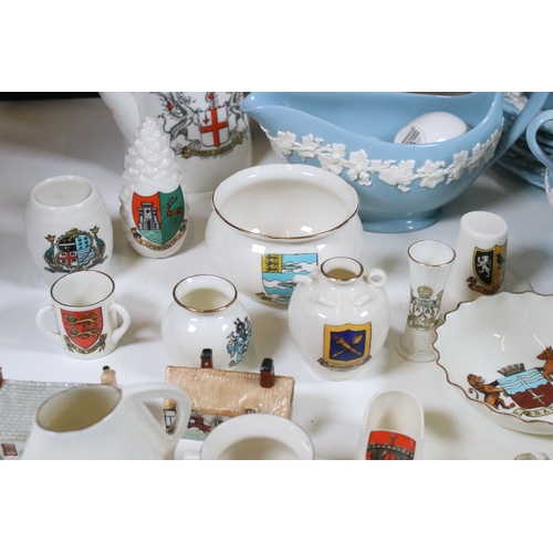 114 - Assortment of mixed ceramics, to include fifty-two Goss crested china souvenirs, one Bristol semi po... 