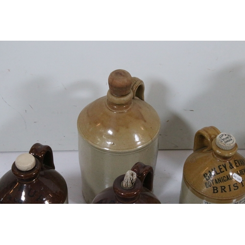 423 - Group of eight stoneware bottles and jars, to comprise examples for 'Pickup Bristol' and 'Powell Bri... 