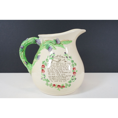 62 - Crown Devon Fieldings musical jug, moulded in relief with an interior scene, with Auld Lang Syne poe... 