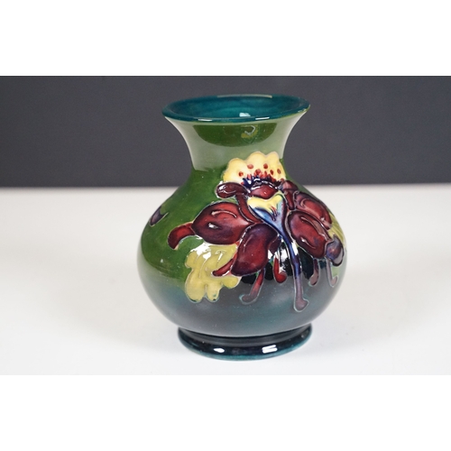 65 - Collection of Moorcroft ceramics to include 2 x Anemone jugs on blue ground (One William Moorcroft e... 